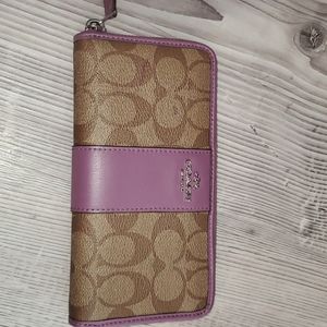 Purple and brown Coach wallet